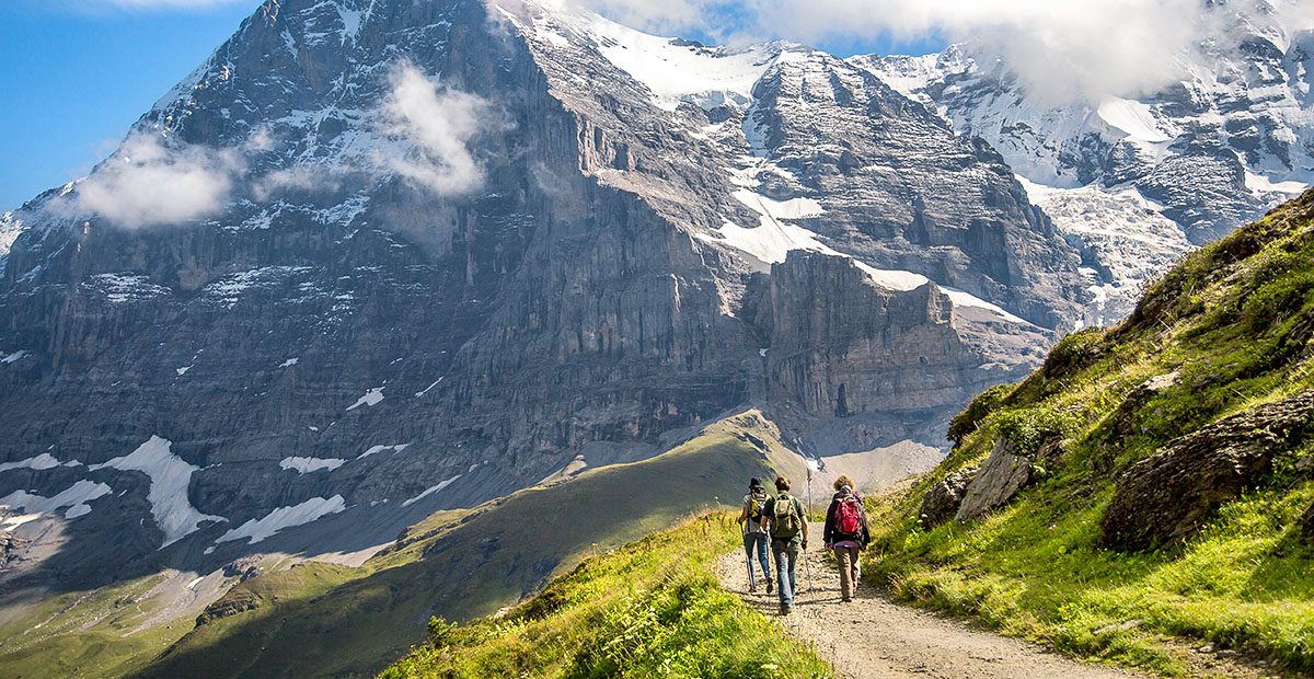19457_SWIT_stock-photo-hikers-on-the-the-eiger-trail-and-the-eiger-a-metre-ft-mountain-of-the-bernese-alps-772878226